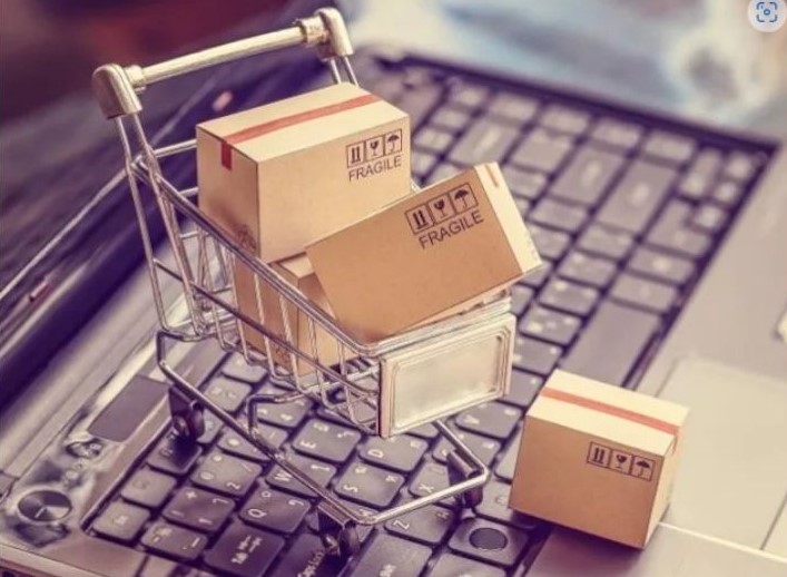 Grocery cart on top of laptop