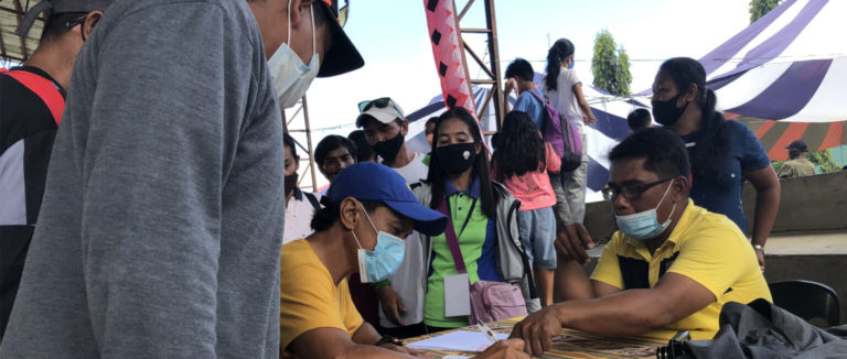 People filling up a form