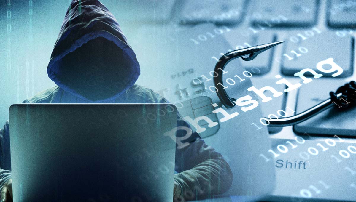 Man in hoodie doing phishing activity