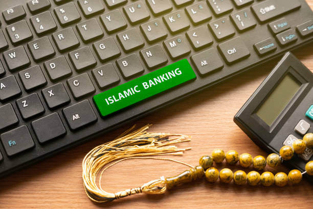A calculator, rosary, and keyboard that bears the words "Islamic Banking.'