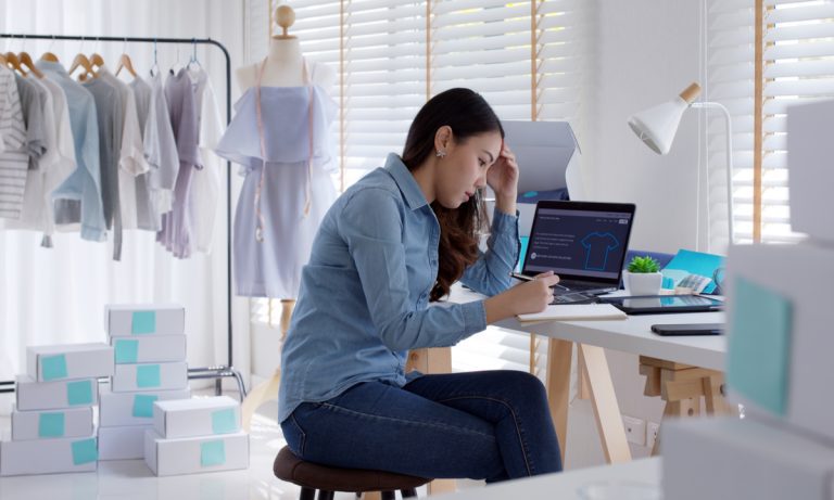 A woman working using her laptop