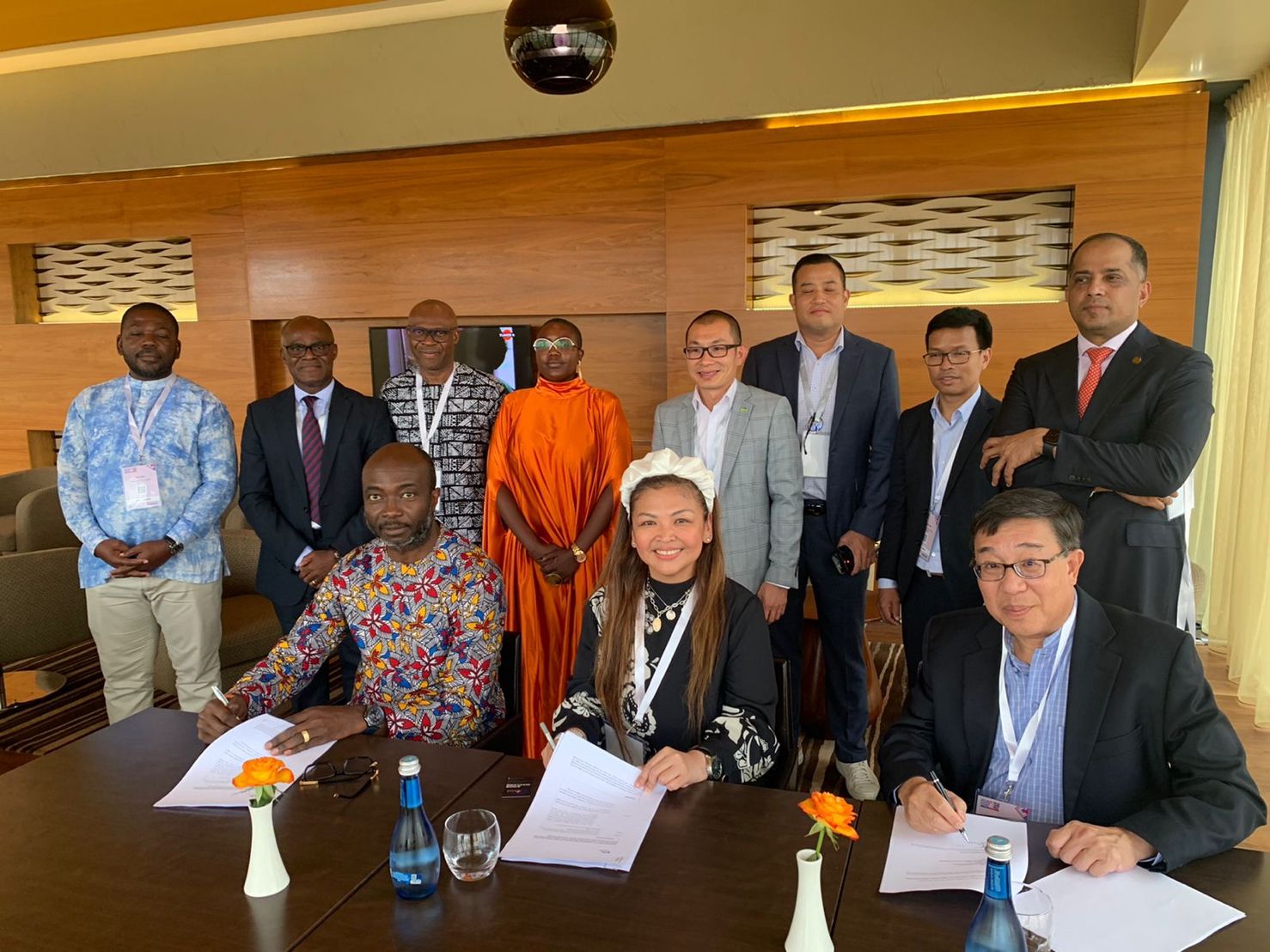 Amor Maclang of Digital Pilipinas while signing the partnership agreement with Professor David Lee of GFI and Dr. Patrick Saidu Conteh of AFN