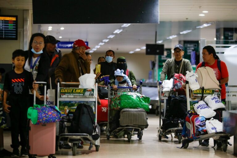 Overseas Filipino Workers arriving home to the Philippines