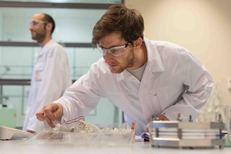 A lab technician from SCG checking out petrochemical products