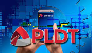 A mobile phone with the Amdocs app and the PLDT logo on top