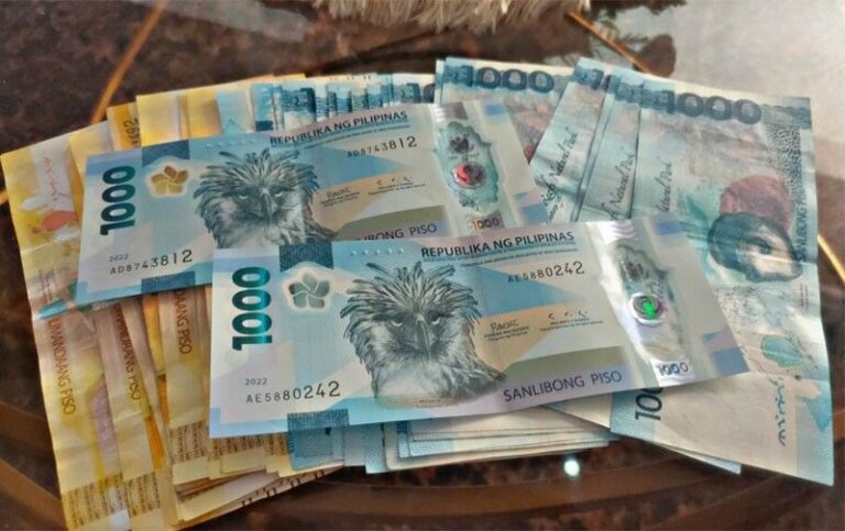 A stack of P500 and P1,000 Peso bills