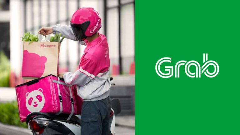 A Grab rider preparing to unload his delivery from Food Panda