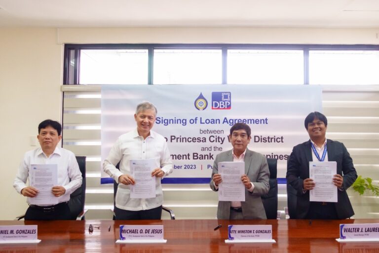 DBP President and CEO Michael O. de Jesus together with executives of the Puerto Princesa City Water District (PPCWD) during the loan agreement signing