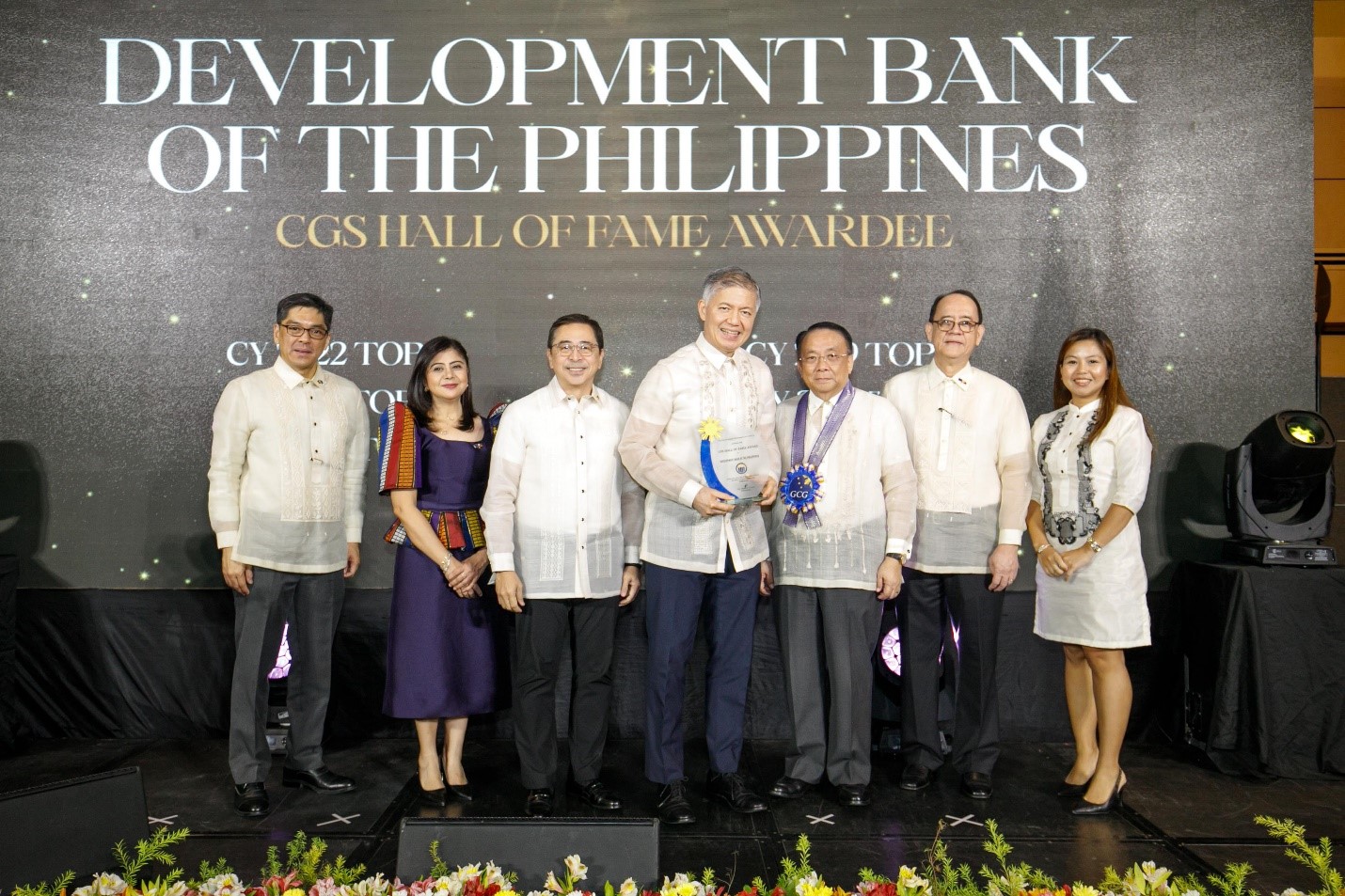 DBP President and CEO Michael O. de Jesus after receiving the CGS Hall of Fame Award for 2022 from Executive Secretary Lucas Bersamin and GCG Chairperson Atty. Marius Corpus