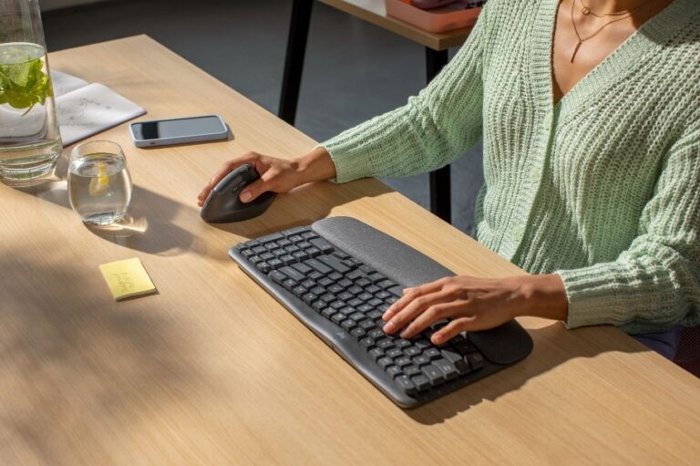 A girl using a new, ergonomic keyboard from Logitech called Wave Keys