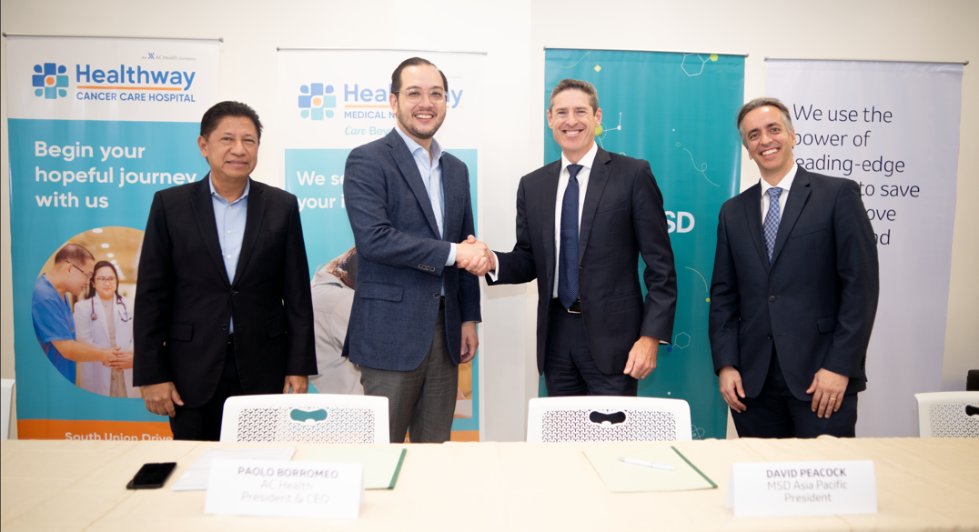 AC Health President and CEO Paolo Borromeo (2nd from left) shakes the hand of MSD Asia Pacific President David Peacock to seal their strategic collaboration to offer high-quality but affordable cancer care in the Philippines. Witnessing the congratulatory handshake are Healthway Philippines, Inc. President and CEO Jaime Ysmael (leftmost) and MSD Philippines President and Managing Director Andreas Riedel