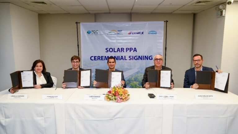 FREE and Cemex executives during the signing ceremony for an agreement that would explore the implementation of various renewable energy and energy efficiency solutions