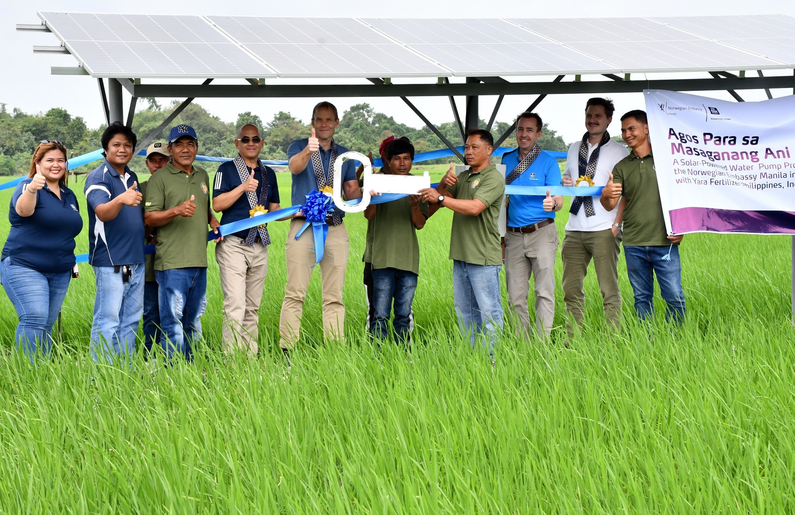 His Excellency Christian Lyster (5th from left), Ambassador, Royal Norwegian Embassy in Manila, together with the solar-powered water pump beneficiaries from Sta. Cruz Farmers Association in Calapan, Oriental Mindoro