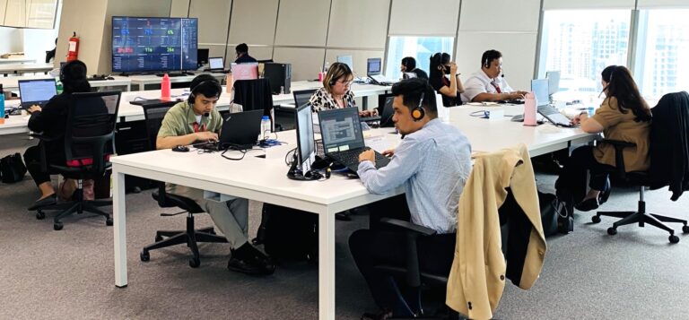 Employees of Chinabank's CCC staff working together using Genesys Cloud
