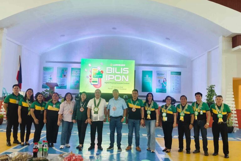 Executives of LANDBANK strike a pose during the roll-out of its "Bilis Ipon: Digital Financial Inclusion Caravan" in the municipality of Plaridel, Misamis Occidental