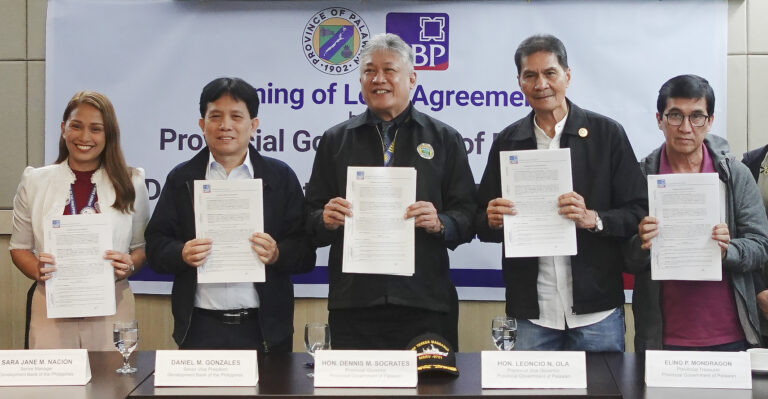 Executives of DBP and the Provincial Government of Palawan led by Governor Dennis Socrates during the loan agreement signing