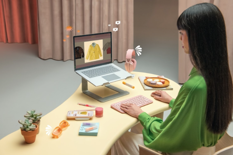 A girl working on her computer using Logitech's new Pebble 2.0 combo