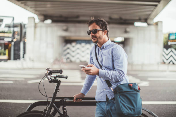 Photo of a man with his bike to promote sustainable mobility