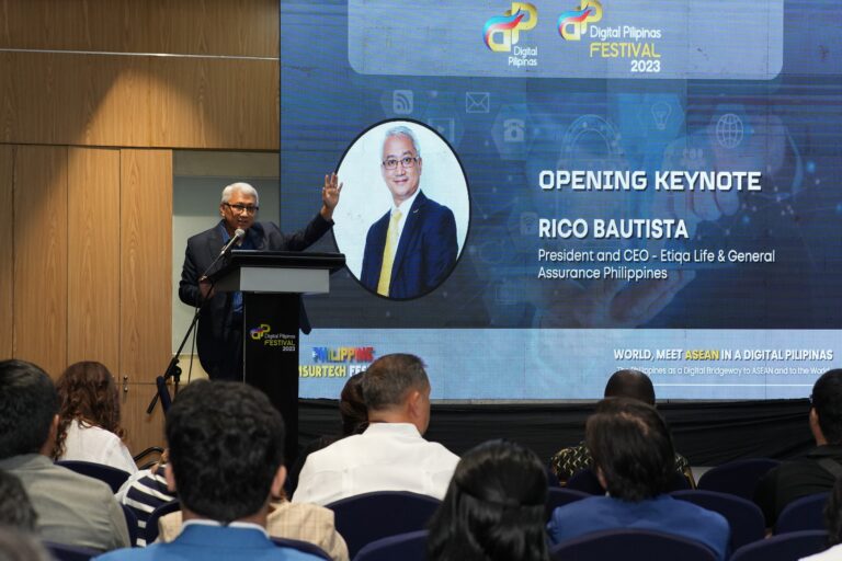 Rico Bautista (with mic), President and CEO of Etiqa Life & General Assurance Philippines