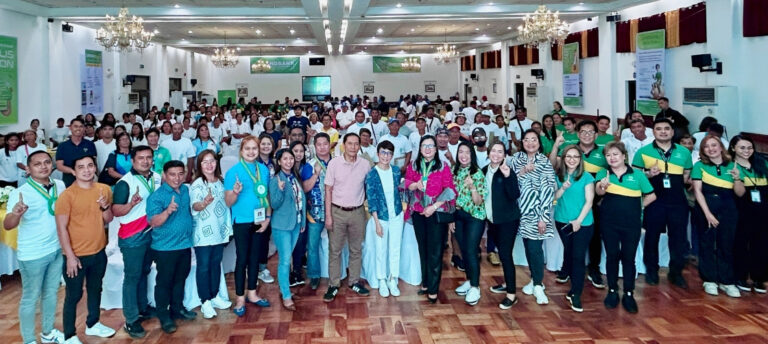 Lynette V. Ortiz (middle), President and CEO of LANDBANK, is shown here after leading the rollout of the Bilis Ipon: Digital Financial Inclusion Caravan in Caoayan, Ilocos Sur