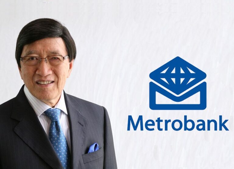 Fabian S. Dee, President of Metrobank, with the bank's logo beside him