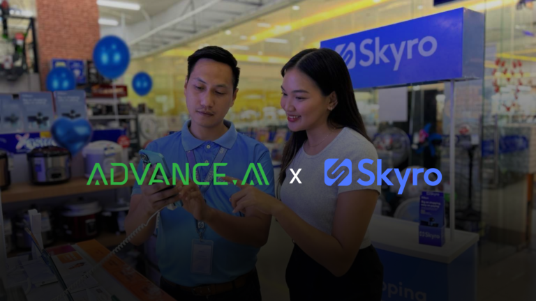 A man teaching a female customer how to use the Skyro app