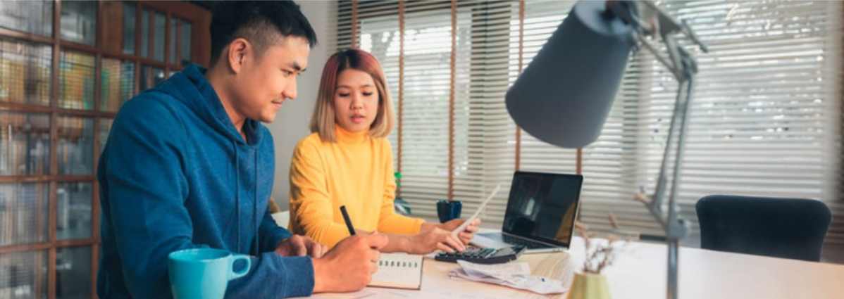 A man and a woman about to apply for a personal loan