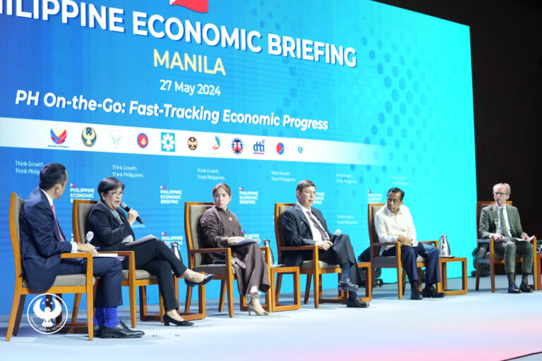 Euben Paracuelles, Chief ASEAN Economist at Nomura, while facilitating the panel discussion with top executives from the BSP, Department of Finance, IMF, and the Department of Budget Management