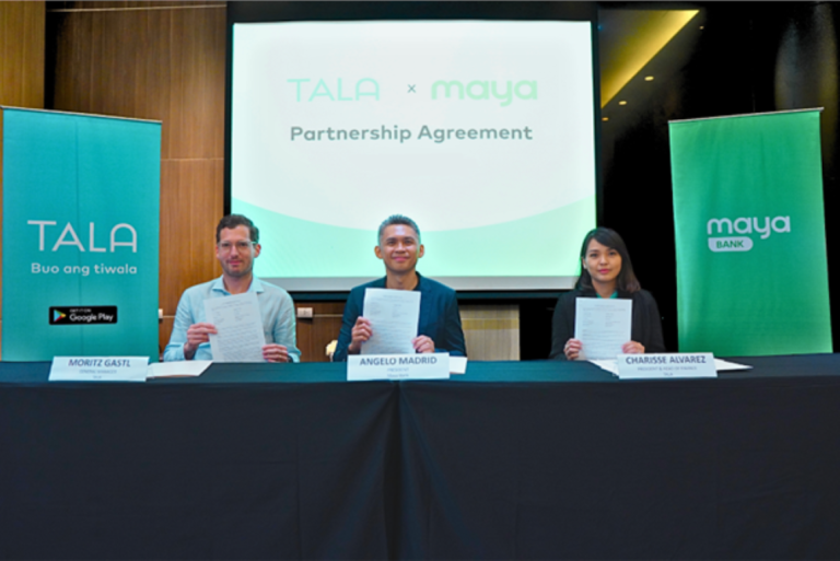 Angelo Madrid, President of Maya Bank, together with Charisse Alvarez, President and Head of Finance at Tala, during the signing of a partnership agreement between Tala and Maya