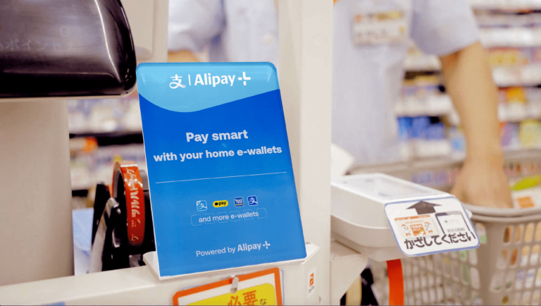Photo of poster inside a store advocating consumers to pay smart using Alipay Plus