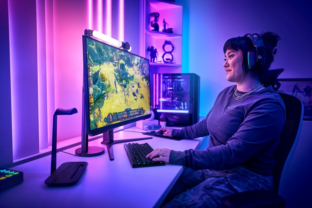 Logitech G has recently unveiled the G515, a revolutionary gaming keyboard, here being enjoyed by a female gamer