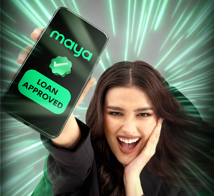 Image of a girl holding a mobile phone to illustrate how Maya is on track to turn profitable by end of 2024