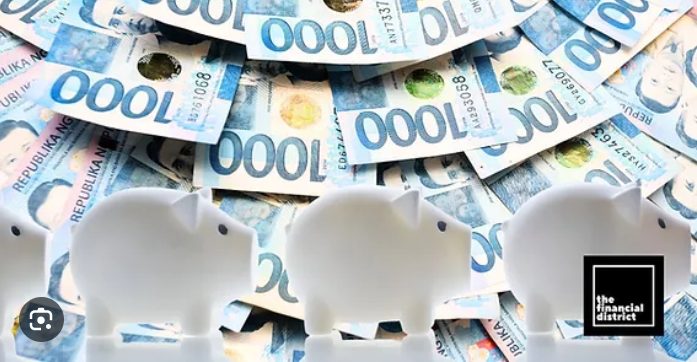 Three piggy banks and a wad of one thousand peso bills to illustrate the effects of BAP launching 2 new initiatives that offer reliable interest rates