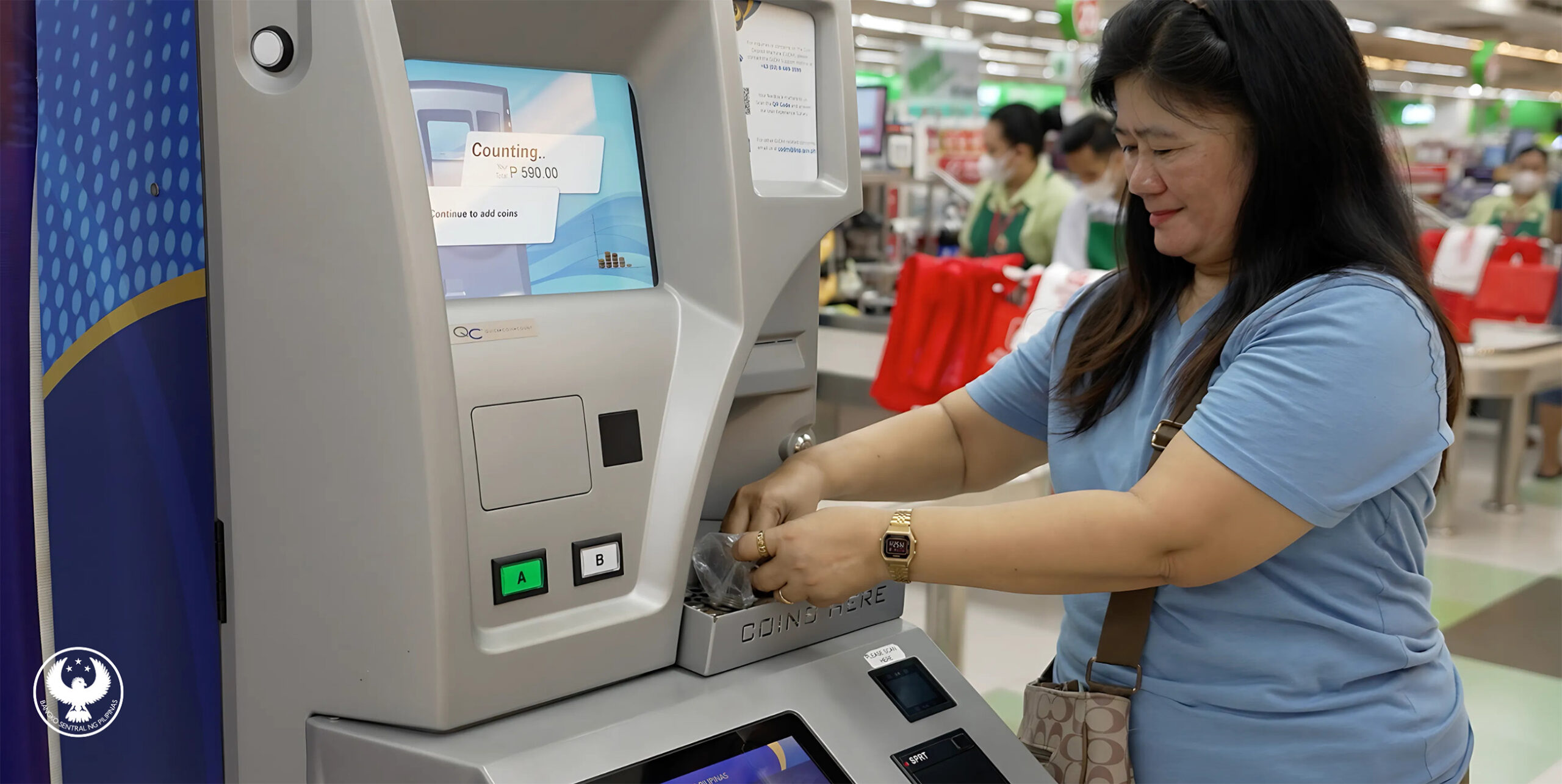 The BSP stated that it has already reached over PhP1 billion in coin collection through CoDMs, shown here while being used by a female sari-sari store owner