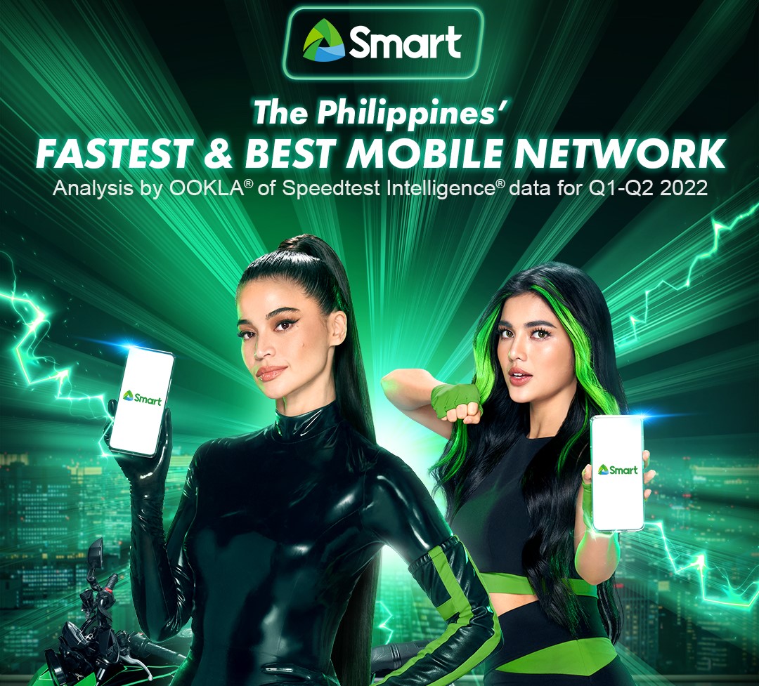 Smart poster showing the company's 2 female endorsers whjle holding a mobile phone with Smart logo
