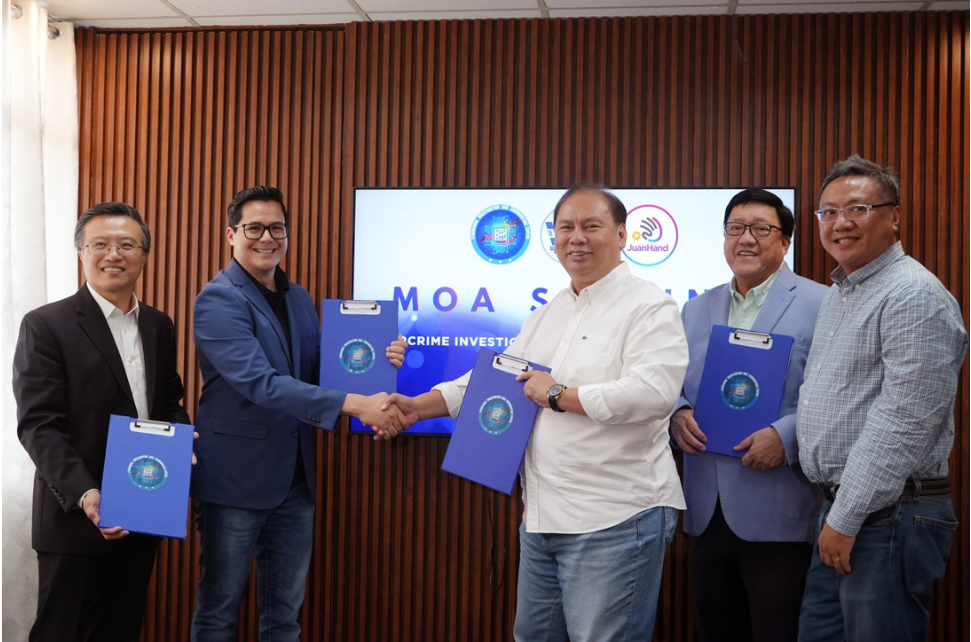 JuanHand executives during the signing of a MOA with the Philippines' Cybercrime Investigation and Coordinating Center
