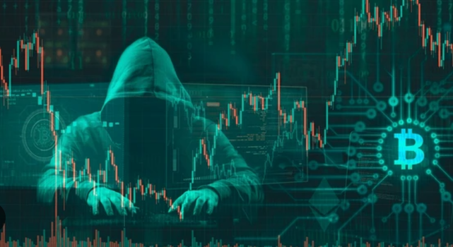 CICC warns of Bitcoin scams, as can be seen in this photo of a hooded cybercriminal while doing his dirty work