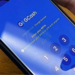 Photo shows a mobile phone with the GCash Cash-in fees app