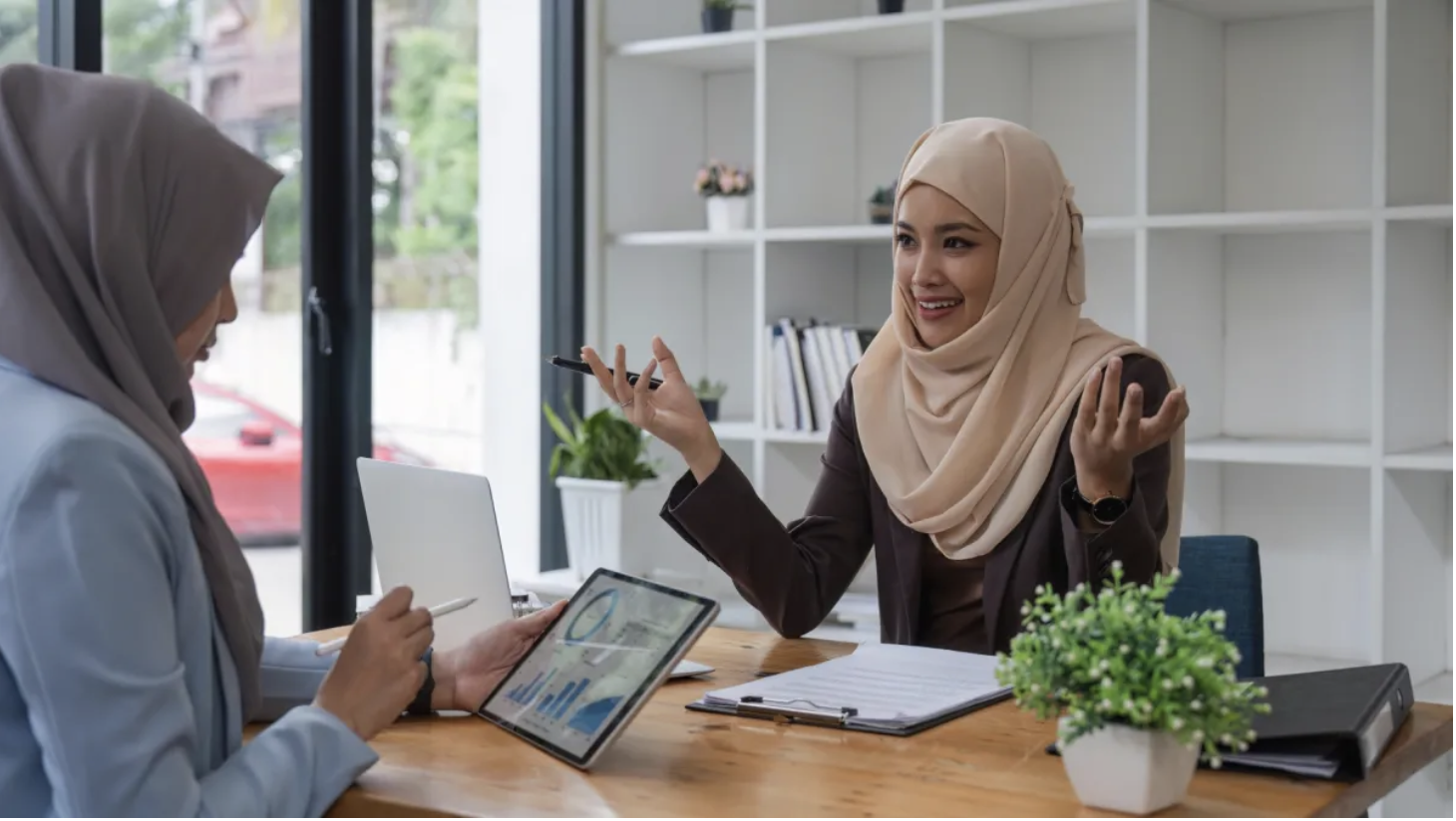Two Muslim women doing Islamic finance as BSP plans to incorporate 'sukuk' in 2025 financing mix