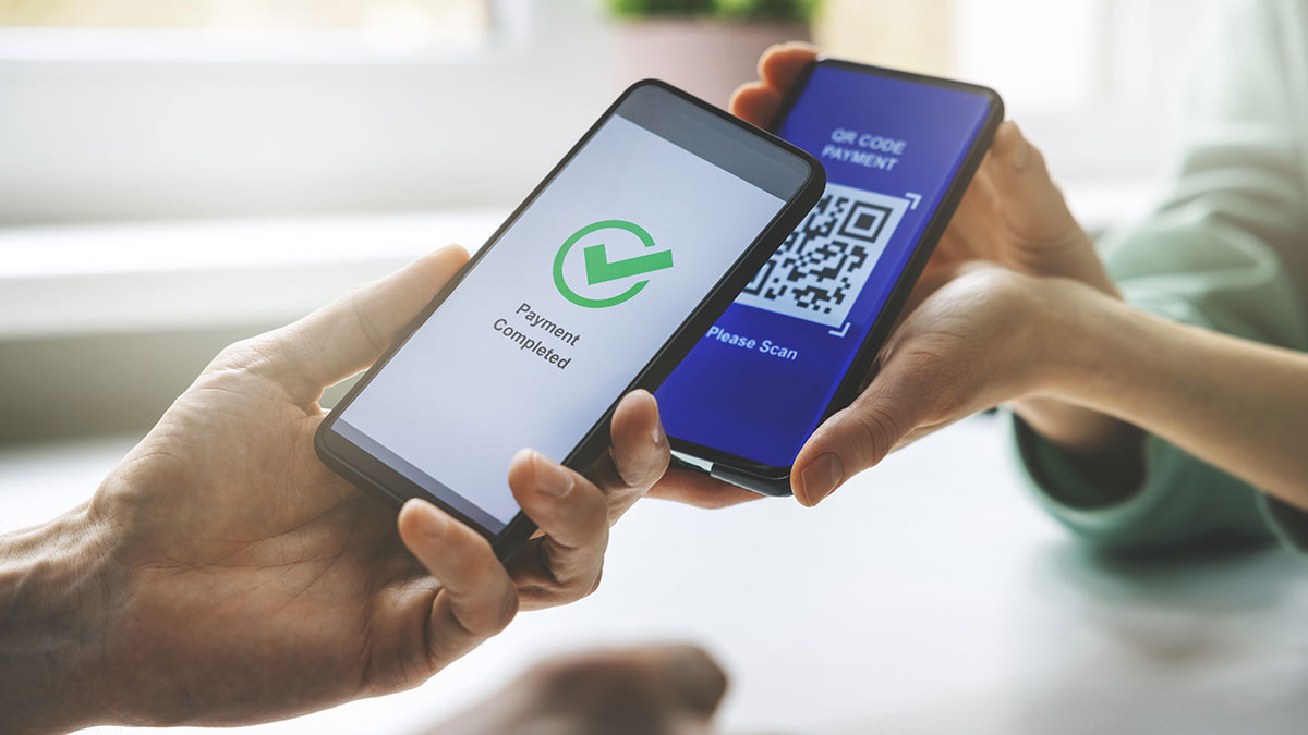 Photo showing a mobile phone being used to pay via QR code as Visa partners with Baguio City to empower MSMEs in the city through digital payments