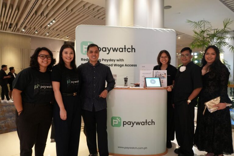 Paywatch and Coronis Health executives strike a pose after forming a partnership to gift employees financial health this holidays