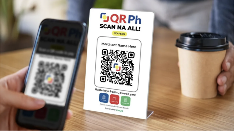 A mobile phone and a unified QR PH standee illustrates how Maya can simplify payments with QR Ph