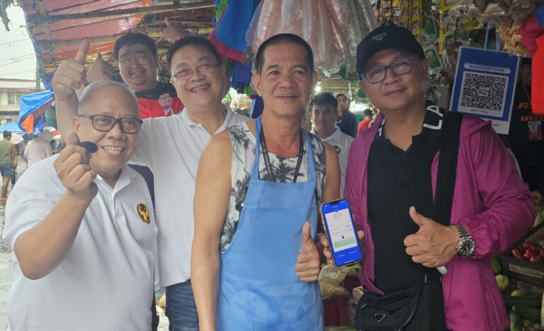 Photo shows BSP Area Director Alvin L. Bermido, BSP Regional Director Tomas J. Cariño, Jr., and Sorsogon City Administrator Atty. Mark Gerald D. Guirindola (in black shirt, representing Mayor Ma. Ester E. Hamor) during the launch of Paleng-QR Ph Plus in Sorsogon