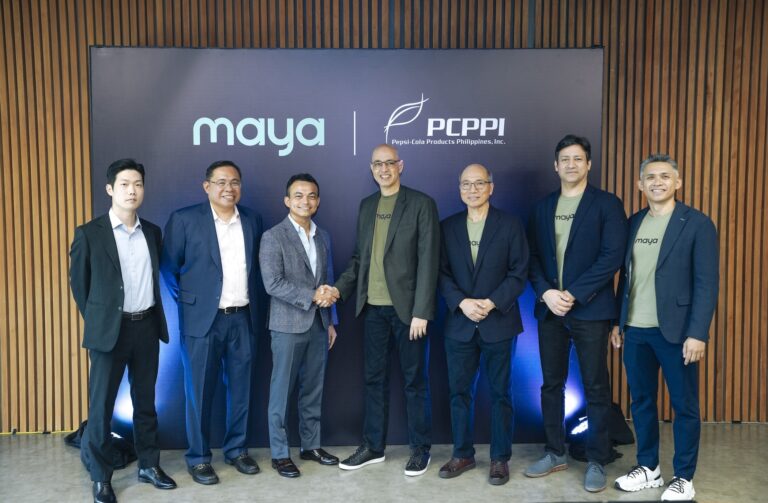 Executives of Maya and Pepsi-Cola during the signing of a partnership that would power distributors and sari-sari store owners with digital payments and credit