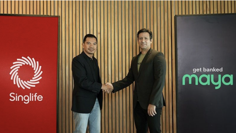 Lester Cruz (left), Chief Executive Officer of Singlife Philippines, and Khurram Malik, Chief Operating Officer of Maya Philippines, while sealing the partnership with a handshake