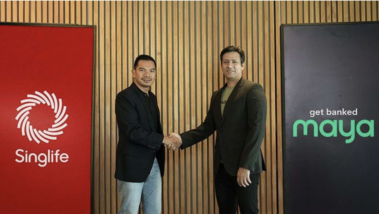 Lester Cruz (left), Chief Executive Officer of Singlife Philippines, and Khurram Malik, Chief Operating Officer of Maya Philippines, while sealing the partnership with a handshake