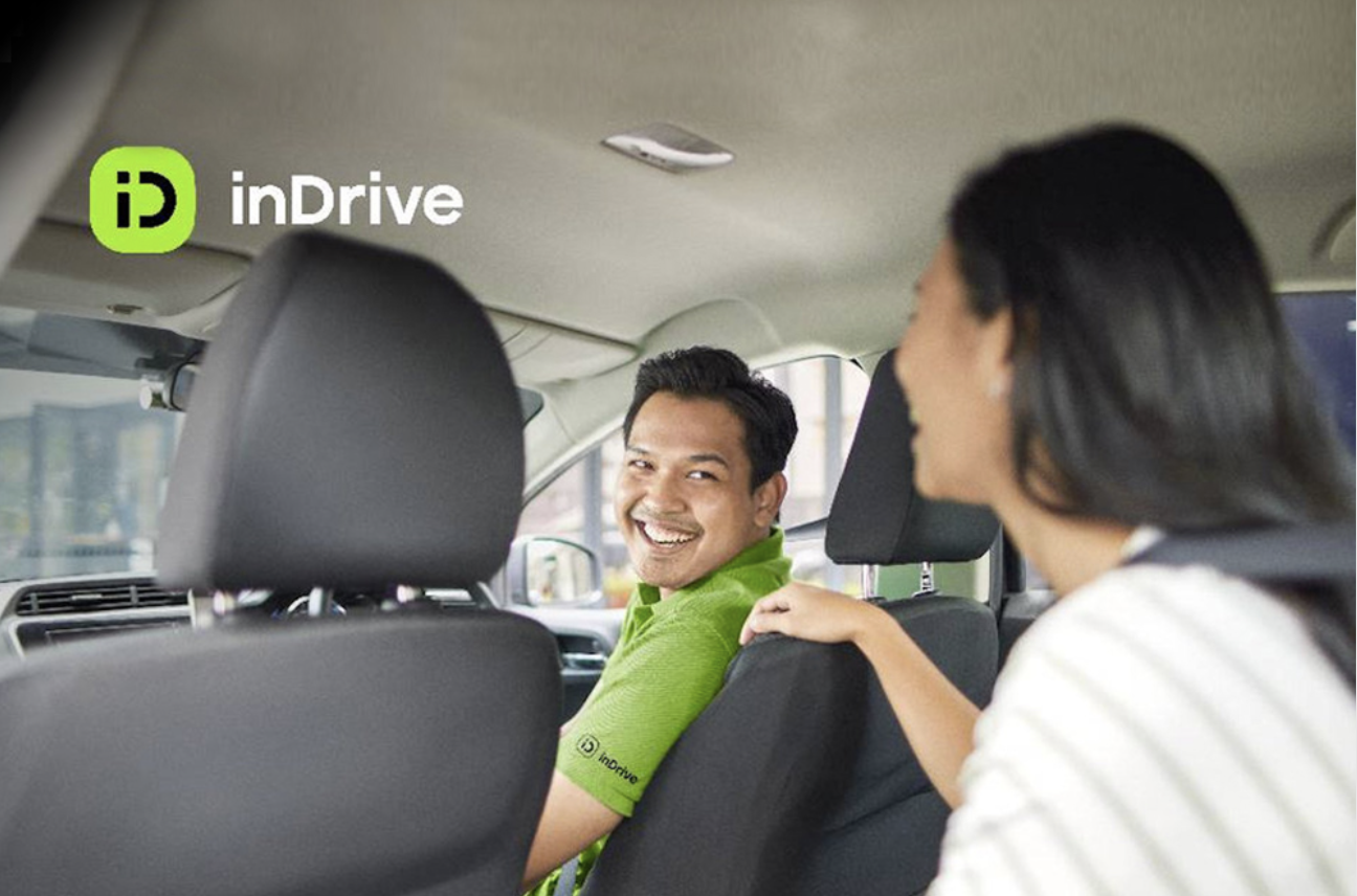 inDrive partner driver talks to his passenger