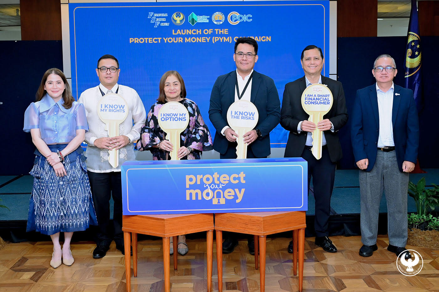 BSP execs at the launch of an anti-scam campaign aimed at fortifying Filipinos for a secure financial future