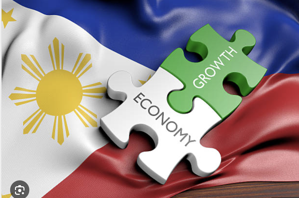 A piece of jigsaw puzzle with the words growth and economy on top of the Philippine flag to illustrate positive credit rating for PH
