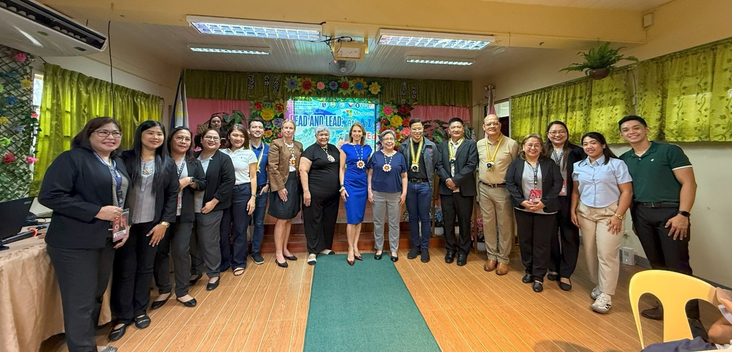 Executives of Microsoft and DepEd gather during an event to expand collaboration, leverage AI to boost Philippine literacy
